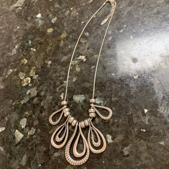 Peter Nygard | Jewelry | Nygard Silver Tone Graduated Loop Pendant ...